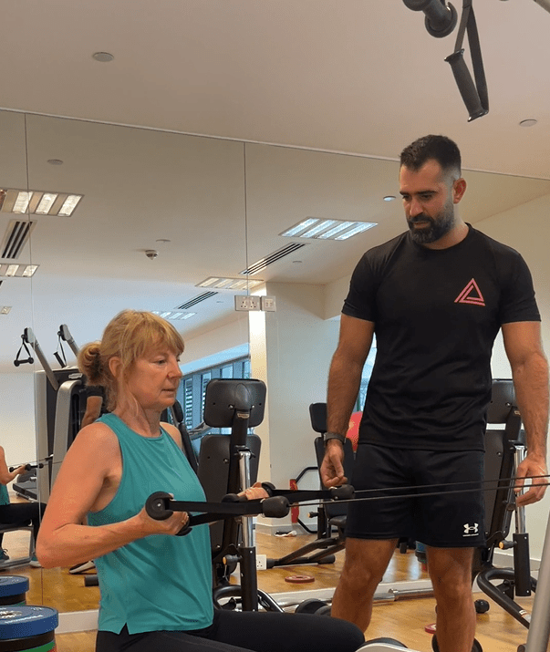 Expert personal trainer at apartment gym in Dubai